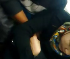 Man touching Woman bubis in train 1